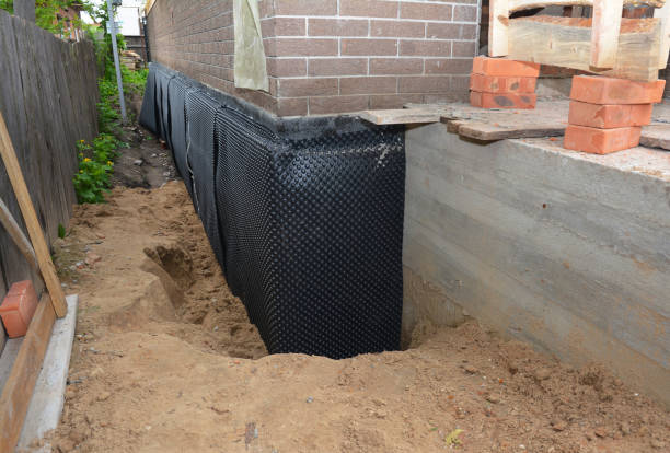 SJ Waterproofing Pros technician performing targeted Foundation Crack Repair assessment in Northville, MI